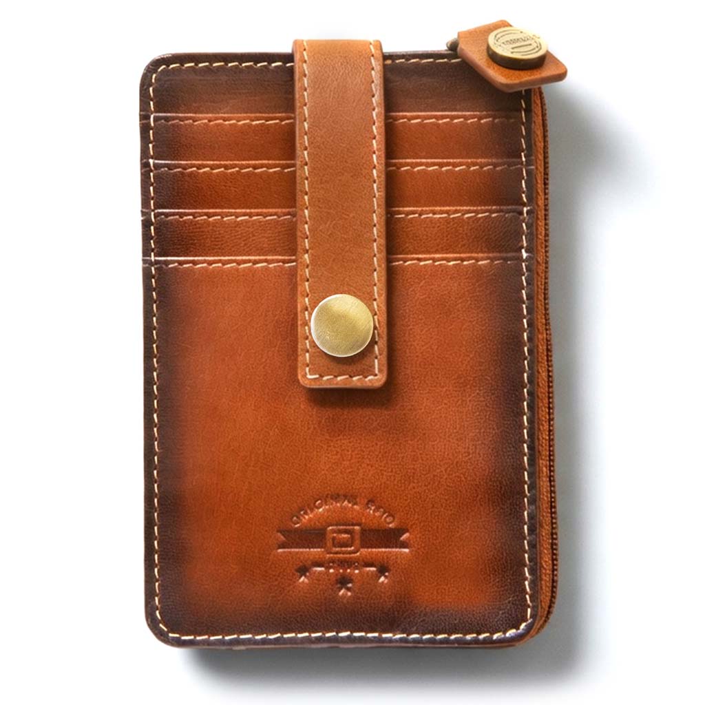 Brown leather wallet with gold accents on a white background