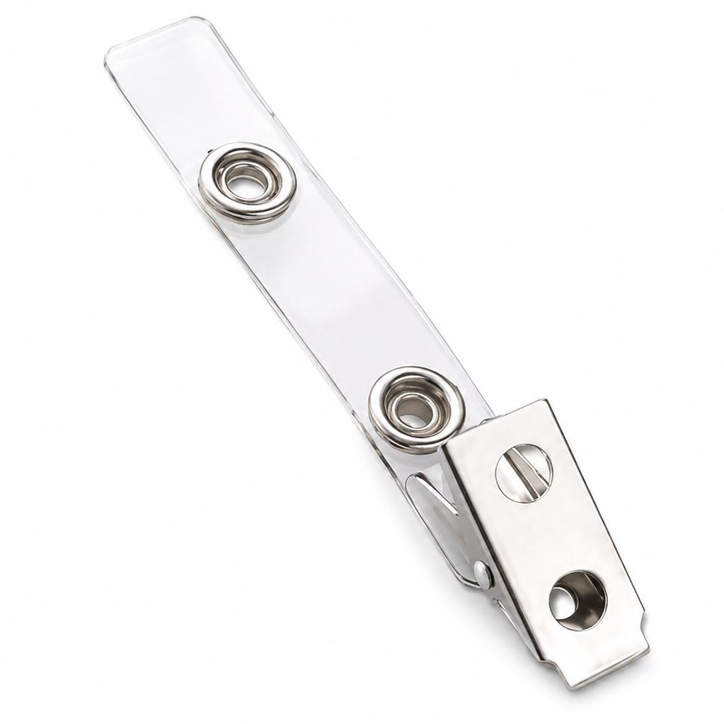 Metallic clip with clear plastic base on a white background