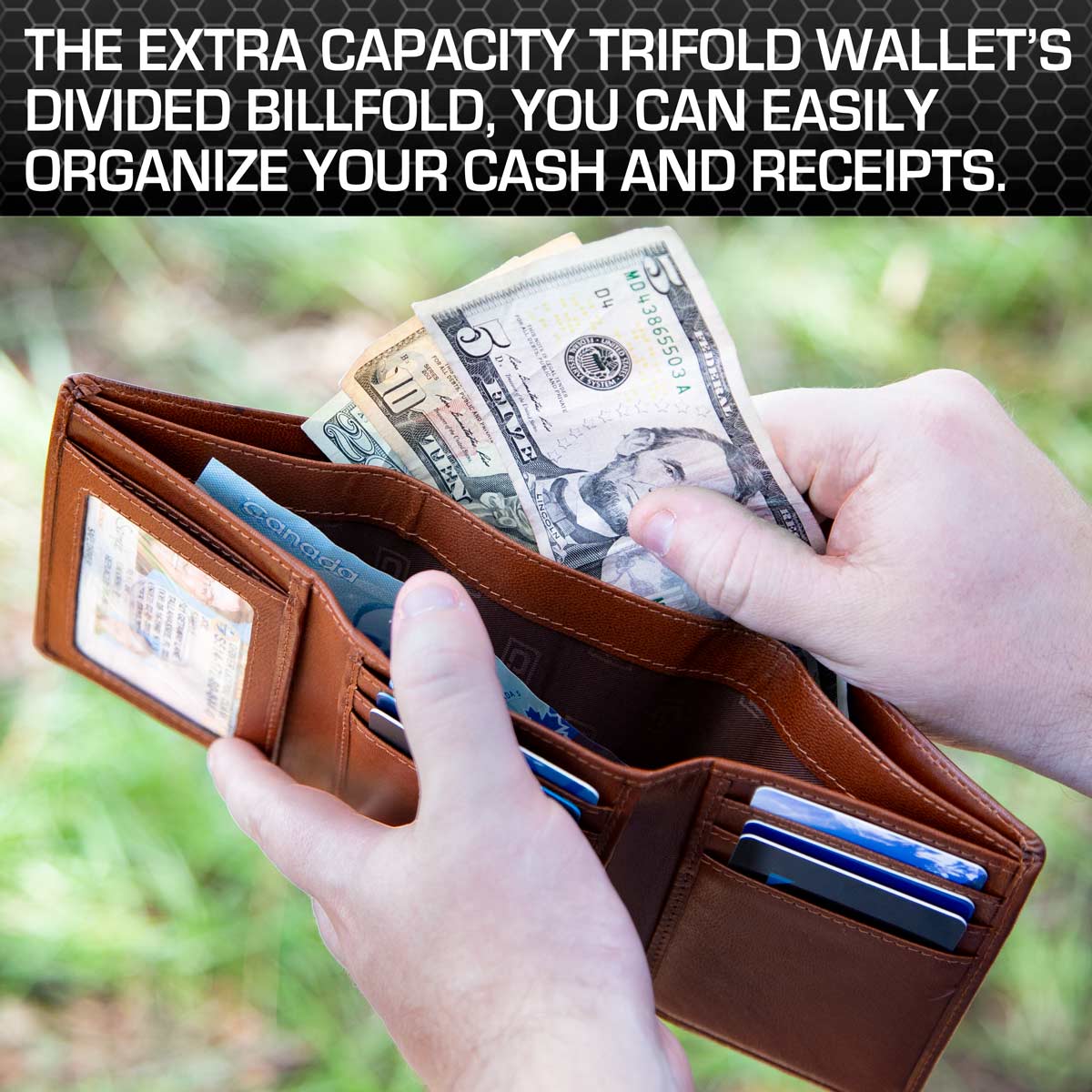Brown trifold wallet with money and cards held by a hand against a blurred natural background