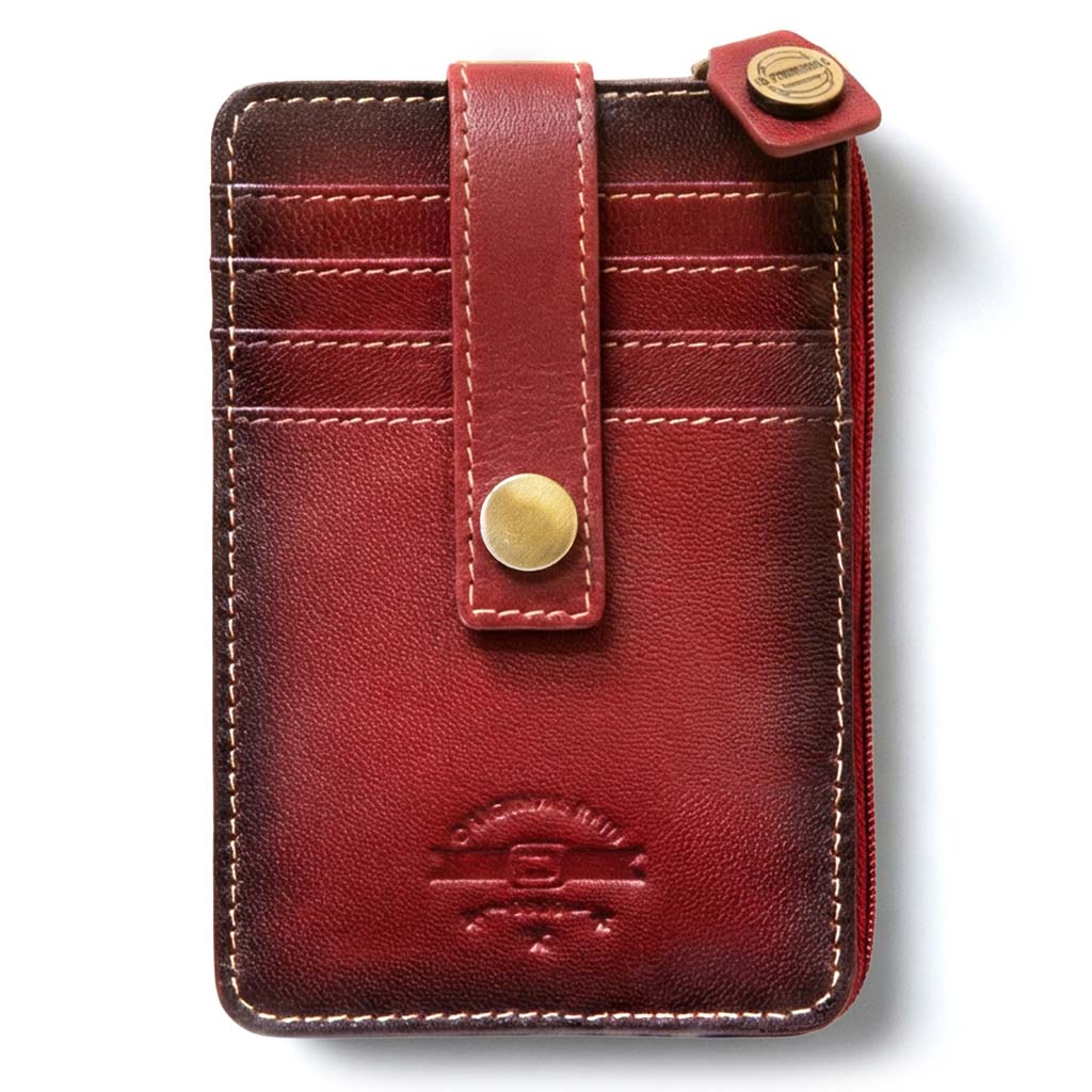 Red leather wallet with gold accents on a white background
